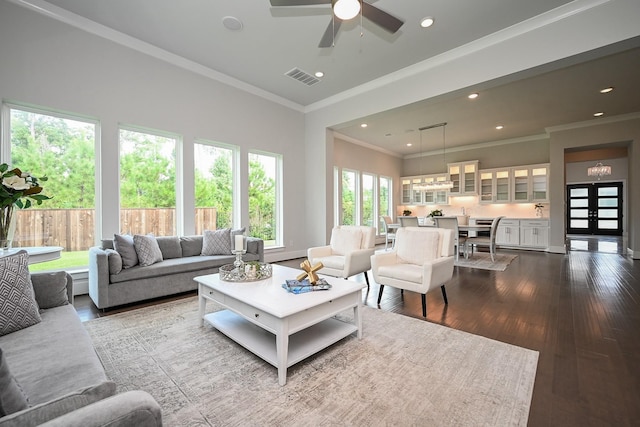 35 Papado Trails Cir, The Woodlands, TX 77375 - living room featuring dark wood-style flooring, recessed lighting, crown molding, and a ceiling fan