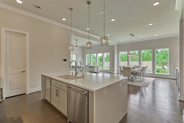 35 Papado Trails Cir, The Woodlands, TX 77375 - kitchen with a sink, dishwasher, recessed lighting, hanging light fixtures, and a center island with sink