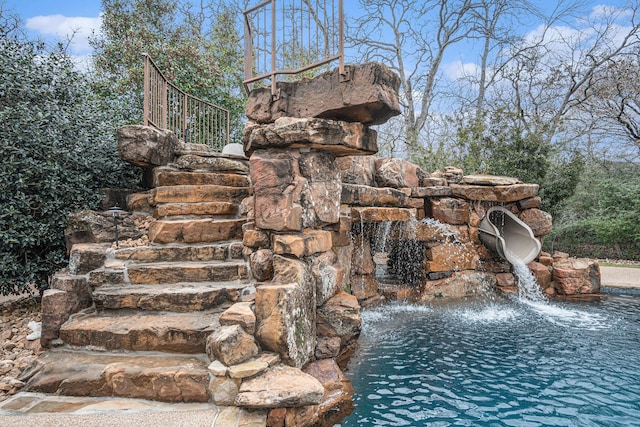 view of pool with stairs