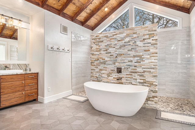 bathroom with vaulted ceiling with beams, wooden ceiling, a freestanding tub, vanity, and visible vents