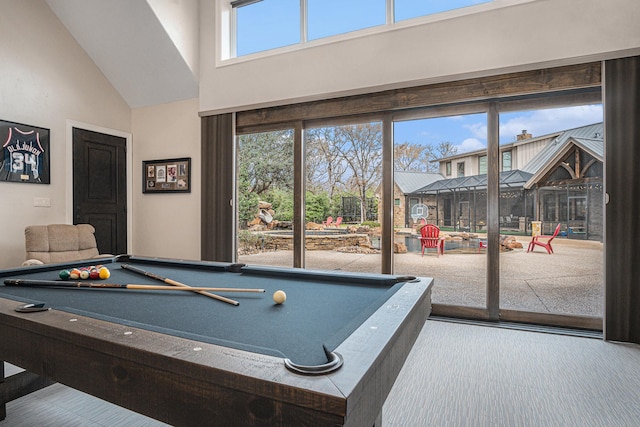 playroom featuring high vaulted ceiling and pool table