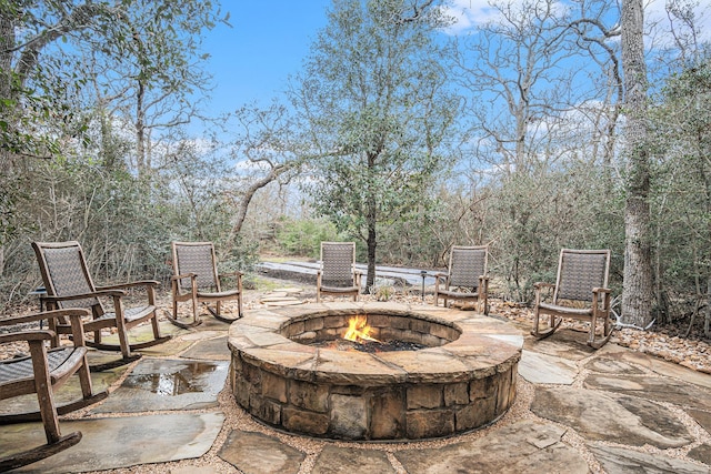 view of patio / terrace featuring a fire pit