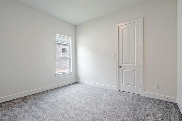 209 Peninsula Point Dr, Montgomery, TX 77356 - carpeted empty room with baseboards