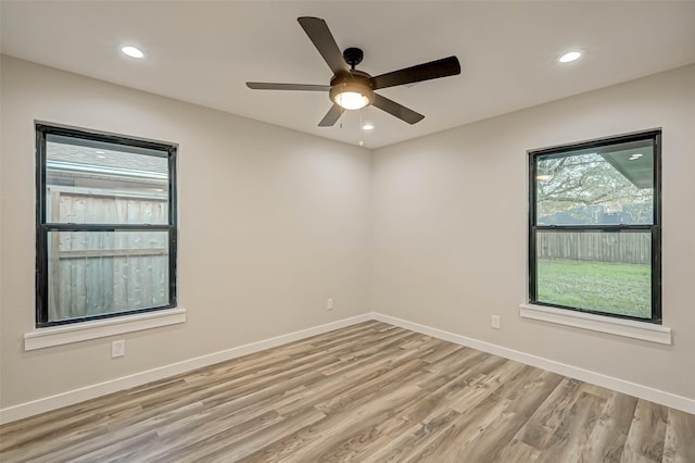 2111 Nina Lee Ln, Houston, TX 77018 - empty room with recessed lighting, light wood-style floors, baseboards, and ceiling fan
