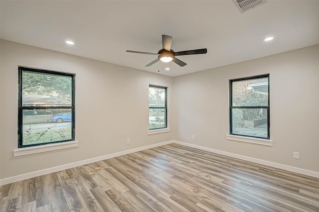2111 Nina Lee Ln, Houston, TX 77018 - empty room featuring baseboards, visible vents, ceiling fan, and light wood-type flooring