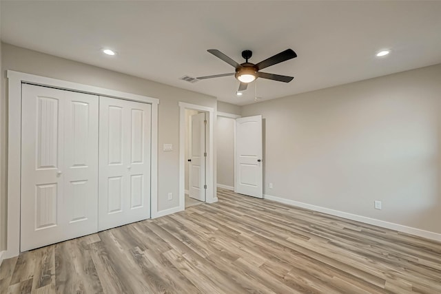 2111 Nina Lee Ln, Houston, TX 77018 - unfurnished bedroom with a closet, visible vents, light wood finished floors, baseboards, and recessed lighting