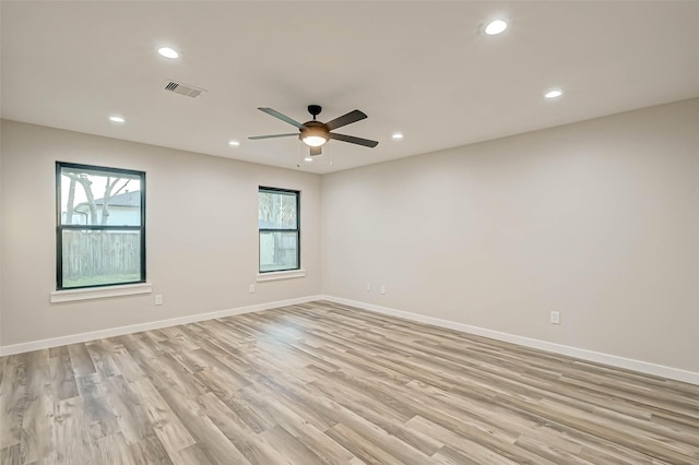 2111 Nina Lee Ln, Houston, TX 77018 - unfurnished room with visible vents, baseboards, light wood-style floors, and recessed lighting