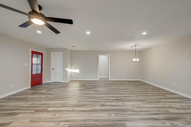2111 Nina Lee Ln, Houston, TX 77018 - unfurnished living room with baseboards, recessed lighting, a ceiling fan, and light wood finished floors