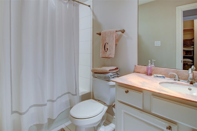 bathroom featuring vanity, shower / bath combination with curtain, and toilet