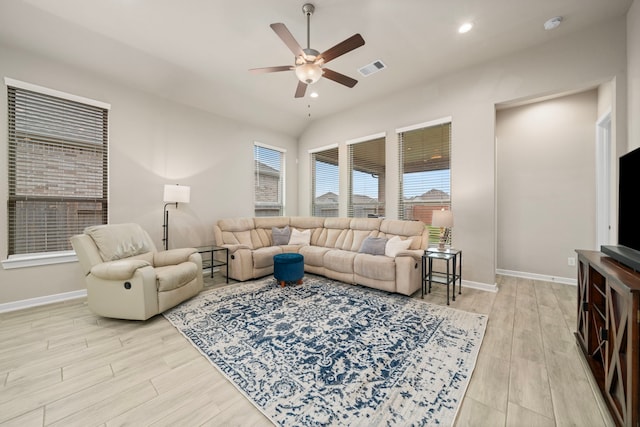 living area featuring light wood-style floors, recessed lighting, baseboards, and a ceiling fan