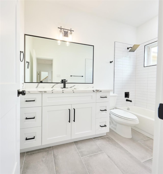 full bathroom with tile patterned flooring, shower / bathing tub combination, vanity, and toilet