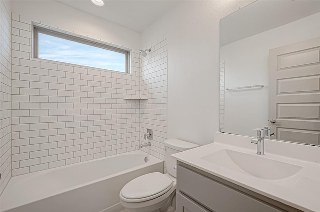 full bath featuring toilet, bathtub / shower combination, and vanity