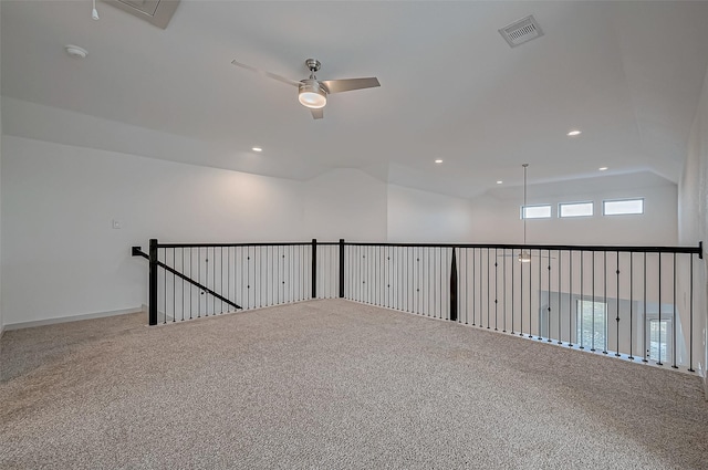 carpeted spare room featuring visible vents, a ceiling fan, and recessed lighting