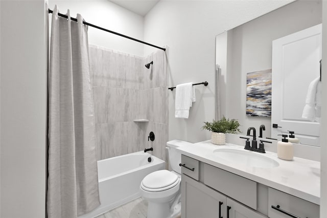 full bath with vanity, toilet, and shower / tub combo with curtain