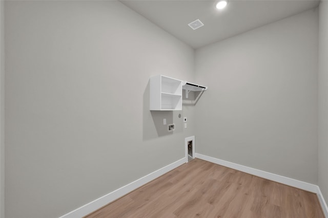 washroom featuring laundry area, baseboards, visible vents, gas dryer hookup, and electric dryer hookup