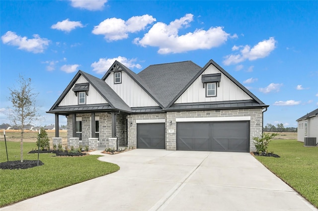 modern farmhouse featuring concrete driveway, roof with shingles, a standing seam roof, a front lawn, and board and batten siding