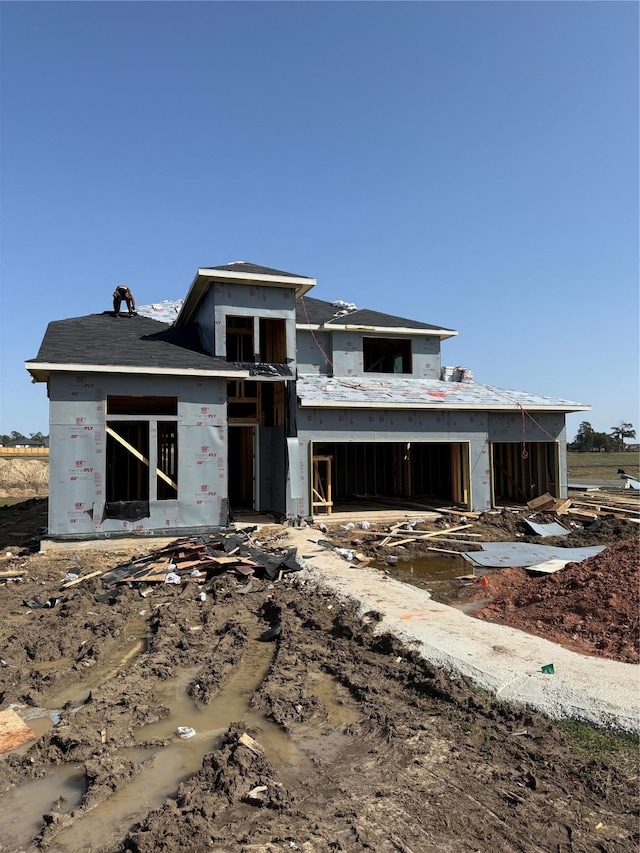 property in mid-construction featuring a garage