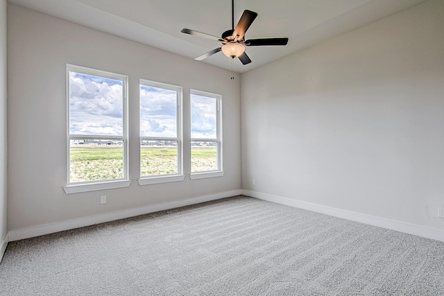 141 Peninsula Point Dr, Montgomery, TX 77356 - carpeted empty room with baseboards and a ceiling fan