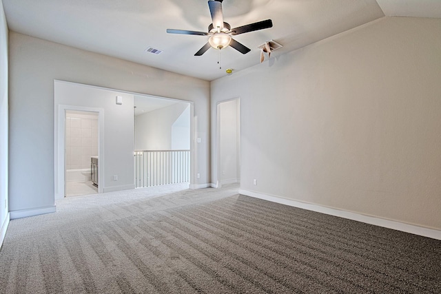 141 Peninsula Point Dr, Montgomery, TX 77356 - empty room with a ceiling fan, baseboards, carpet, and lofted ceiling