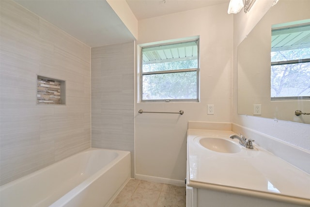 full bathroom with vanity, baseboards, and tile patterned floors