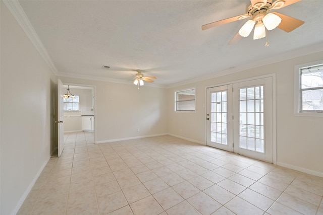 spare room featuring light tile patterned floors, baseboards, crown molding, and ceiling fan with notable chandelier