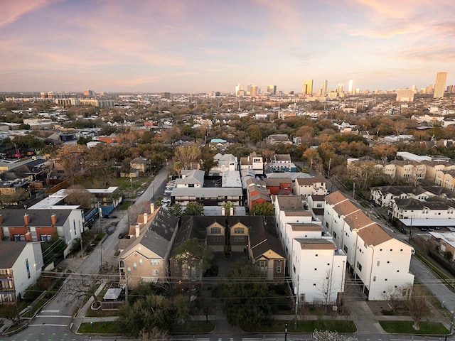 aerial view at dusk with a view of city