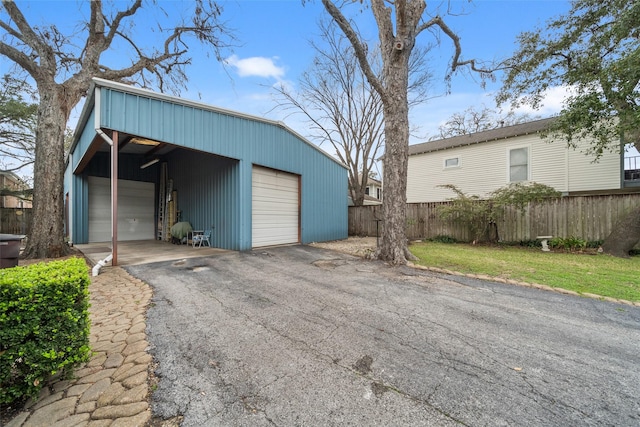 detached garage with fence