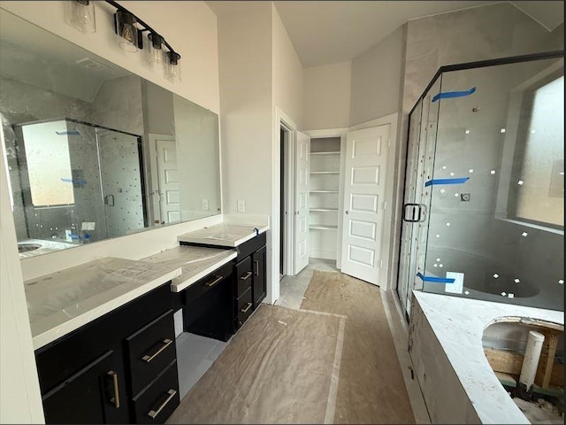 438 Silver Moon Way, Katy, TX 77493 - full bath with a stall shower, vanity, and a walk in closet