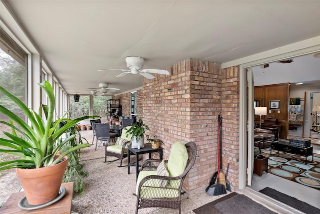 sunroom / solarium with a wood stove