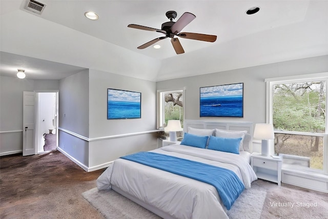 bedroom with carpet, multiple windows, visible vents, and baseboards