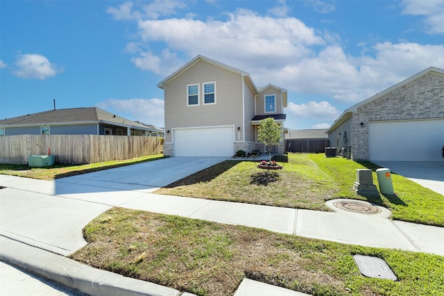 traditional home featuring concrete driveway, central AC unit, fence, a garage, and a front lawn