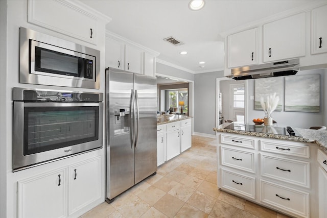 kitchen featuring under cabinet range hood, white cabinetry, visible vents, ornamental molding, and appliances with stainless steel finishes