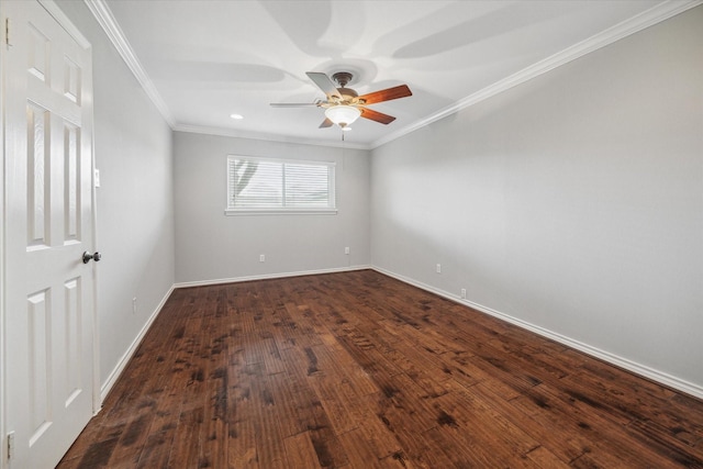 spare room featuring baseboards, dark wood finished floors, a ceiling fan, and crown molding