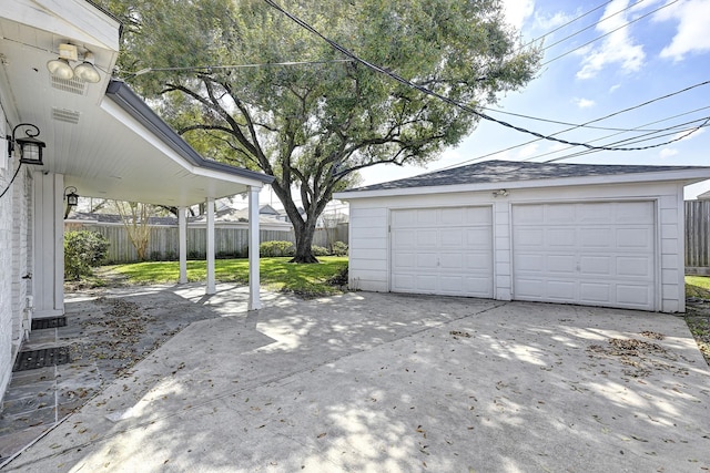 detached garage with fence