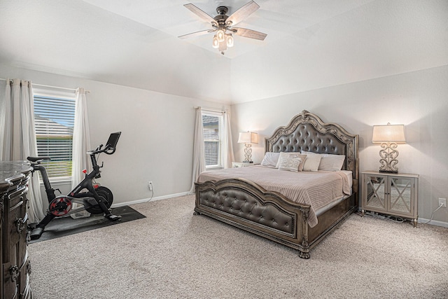 bedroom with lofted ceiling, ceiling fan, carpet, and baseboards