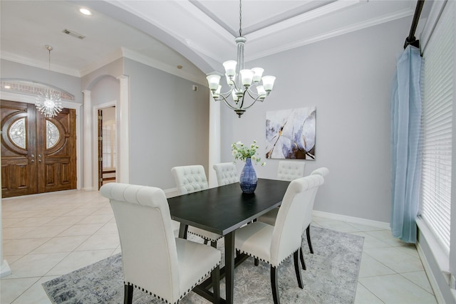 dining room featuring ornamental molding, visible vents, an inviting chandelier, and light tile patterned floors