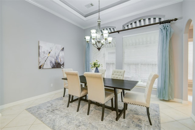 dining space featuring light tile patterned floors, baseboards, visible vents, crown molding, and a chandelier