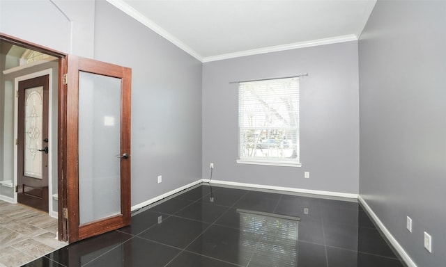 unfurnished room featuring tile patterned flooring, crown molding, and baseboards