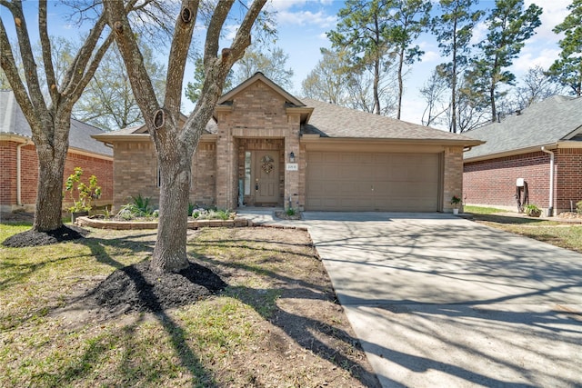 ranch-style house with brick siding, a garage, driveway, and roof with shingles