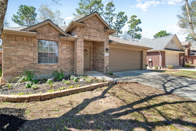 view of front facade with a garage, brick siding, concrete driveway, and a shingled roof