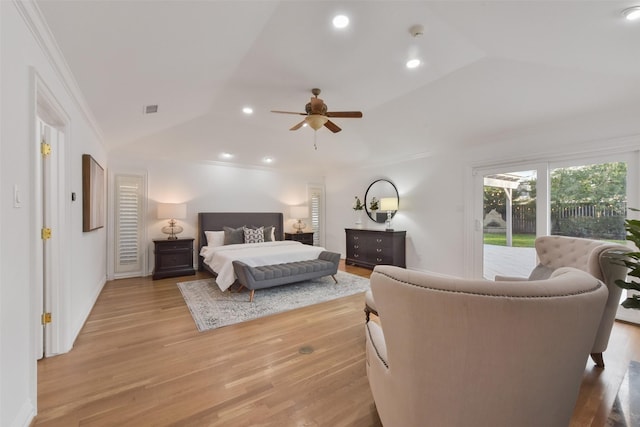 bedroom featuring access to exterior, recessed lighting, light wood-style floors, and vaulted ceiling