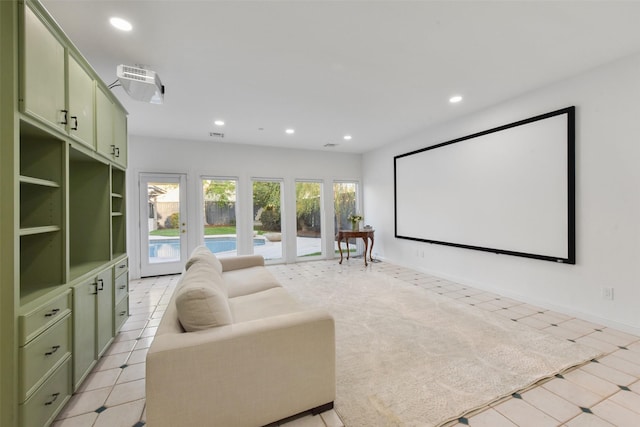 home theater room with recessed lighting and baseboards