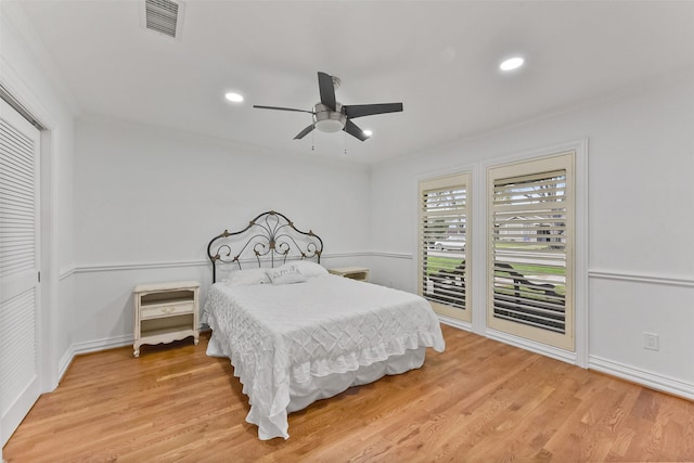 bedroom featuring recessed lighting, visible vents, and light wood-style flooring