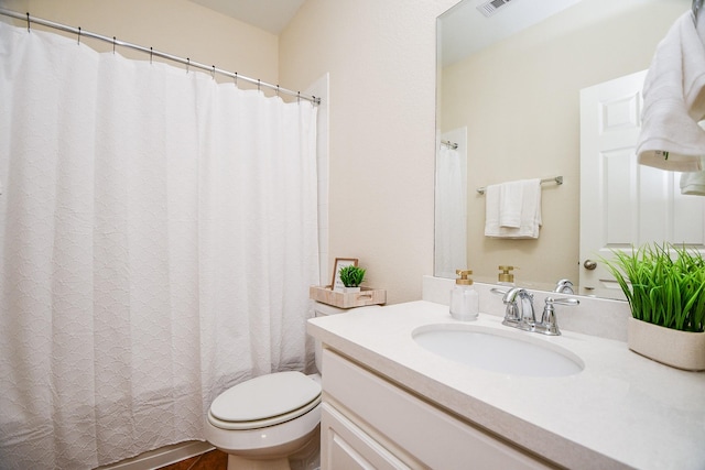 full bath with shower / bath combination with curtain, visible vents, vanity, and toilet