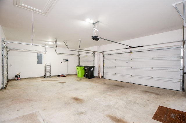 garage featuring electric panel and a garage door opener