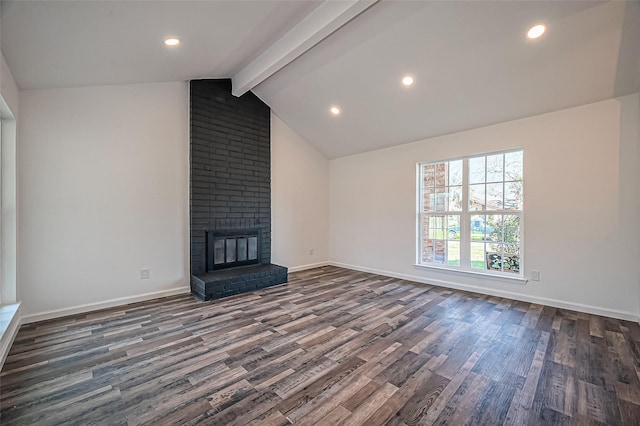 unfurnished living room with lofted ceiling with beams, a brick fireplace, baseboards, and dark wood-style floors