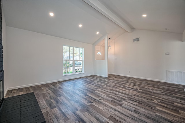 unfurnished living room with dark wood finished floors, visible vents, vaulted ceiling with beams, and baseboards