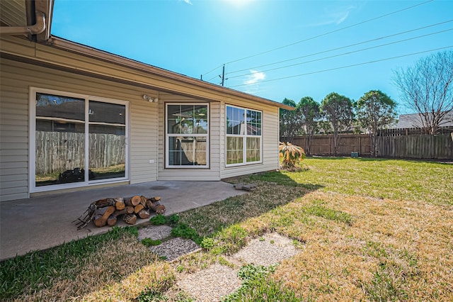 view of yard with a patio area and fence