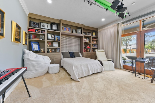 carpeted bedroom with ornamental molding and recessed lighting