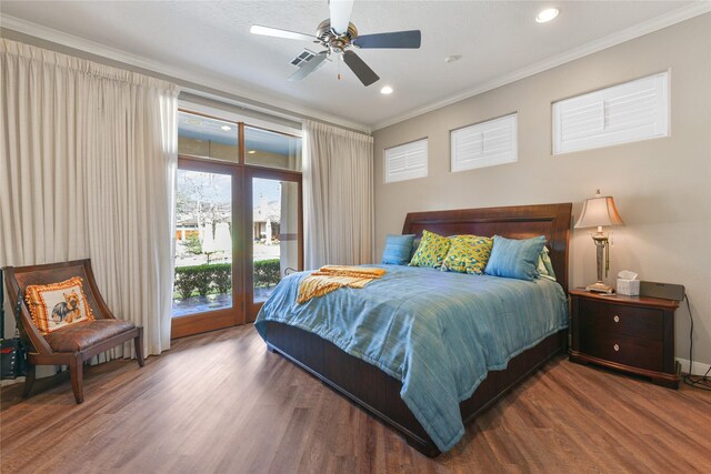 bedroom with crown molding, recessed lighting, wood finished floors, and access to exterior